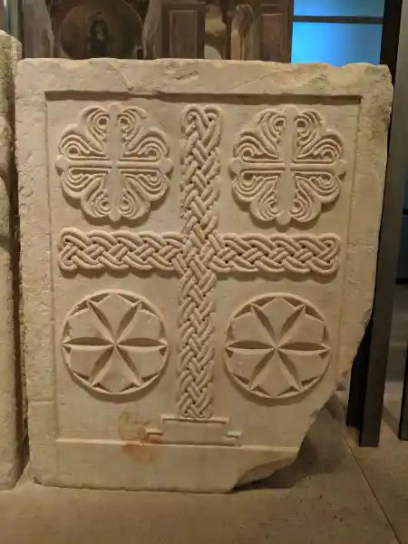 Marble closure slab with relief interlaced cross and four corner crosses